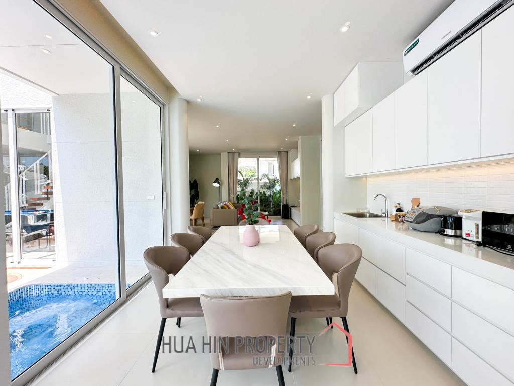 Modern pool villa with slide in Pak Nam Pran