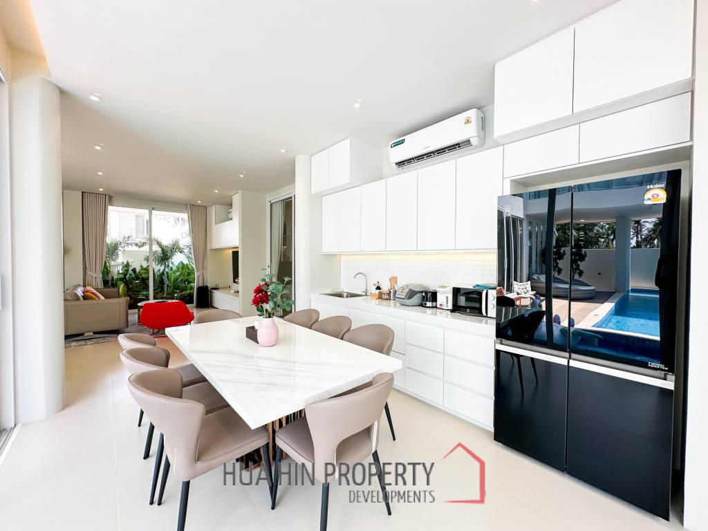 Modern pool villa with slide in Pak Nam Pran