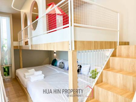 Modern pool villa with slide in Pak Nam Pran