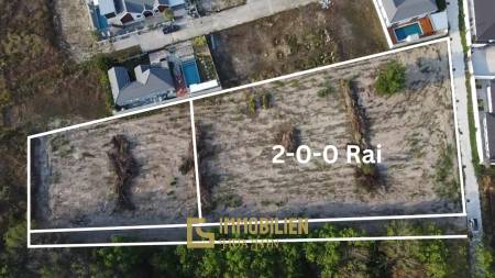 Земельный участок площадью 3200 кв. м / прямоугольной формы / с подъездом с улицы.