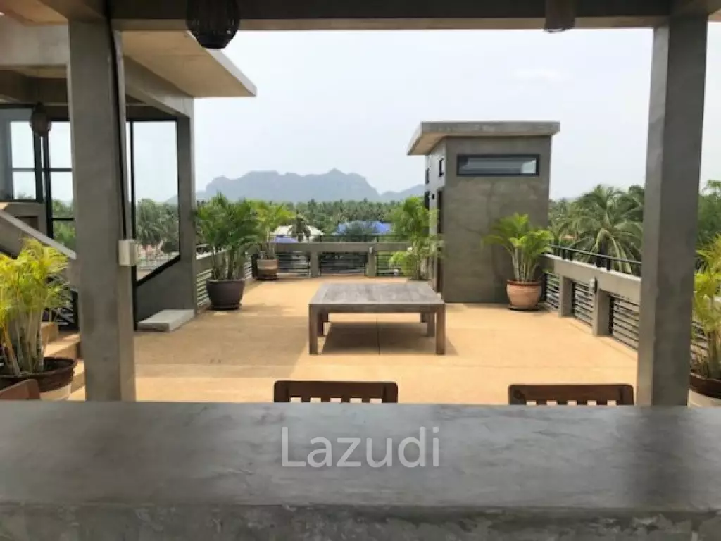 Modern designer 3 storey pool villa with roof terrace with sea views, only 200 meters from pristine Beach