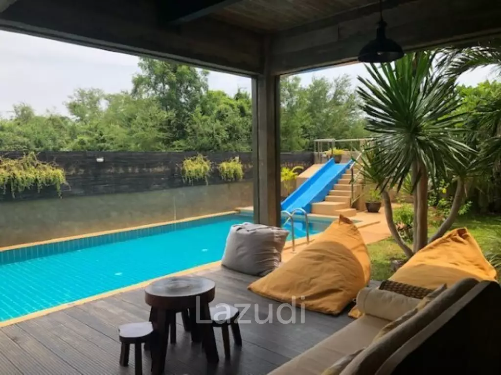 Modern designer 3 storey pool villa with roof terrace with sea views, only 200 meters from pristine Beach