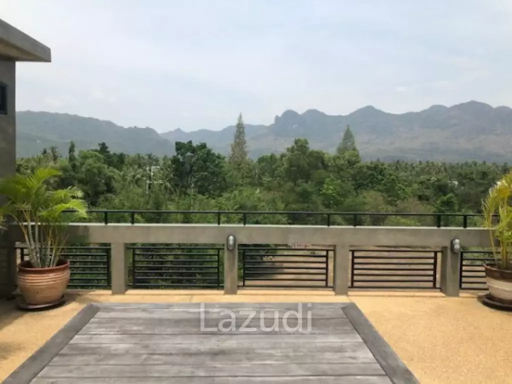 Modern designer 3 storey pool villa with roof terrace with sea views, only 200 meters from pristine Beach