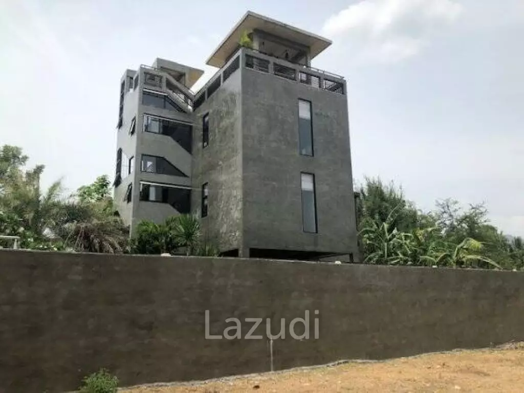 Modern designer 3 storey pool villa with roof terrace with sea views, only 200 meters from pristine Beach