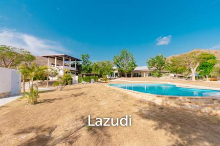 SIGNATURE PRIVATE ESTATE WITH POOL AND MOUNTAIN VIEWS ON PLOT 7 RAI