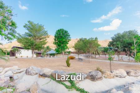 SIGNATURE PRIVATE ESTATE WITH POOL AND MOUNTAIN VIEWS ON PLOT 7 RAI