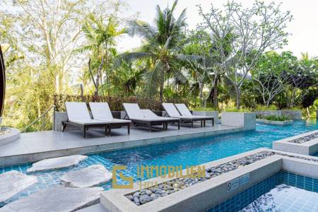 Surface habitable de 105 m² / 2 chambres + 2 salles de bains / piscine privée