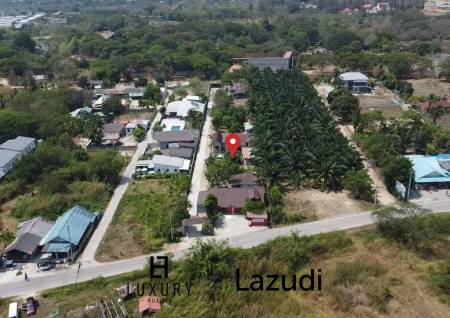 Terrain de 1260 m² / Maison individuelle / 3 chambres