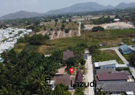 Terrain de 1260 m² / Maison individuelle / 3 chambres