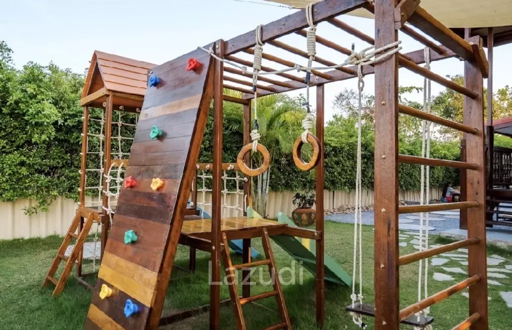 Glass-walled restaurant with gardens in Cha Am