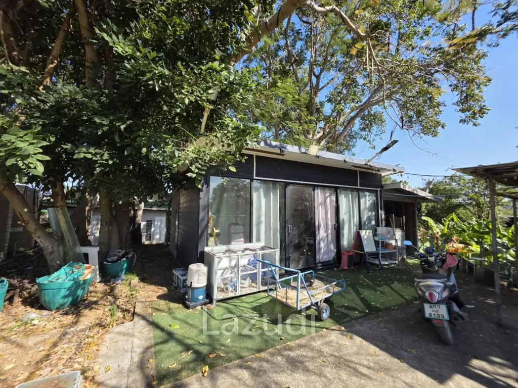 Massive 14-Rai Prime Land with House in Sattahip