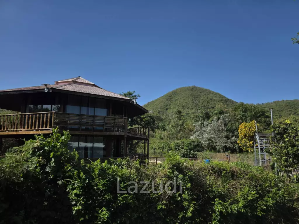Massive 14-Rai Prime Land with House in Sattahip