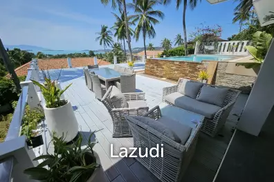 Sea View 4-Bedroom Villa with Expansive Tropical Garden in Prime Bang Rak
