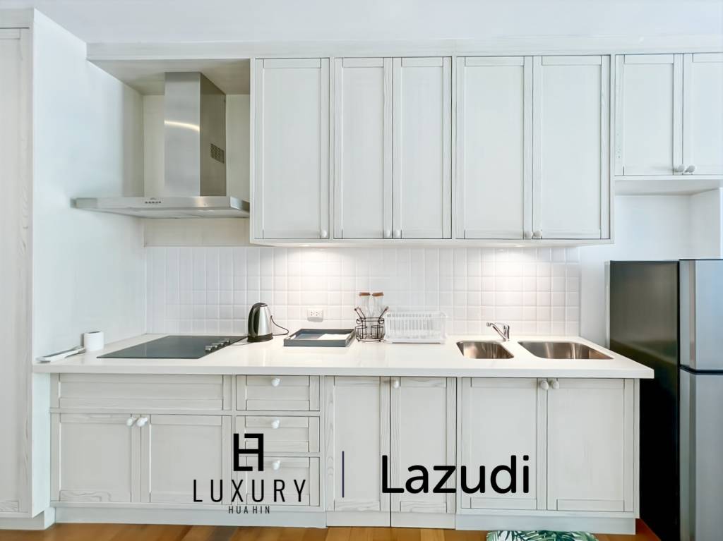 คอนโดรีโนเวทใหม่ 2 ห้องนอน วิวสระ ใน Malibu