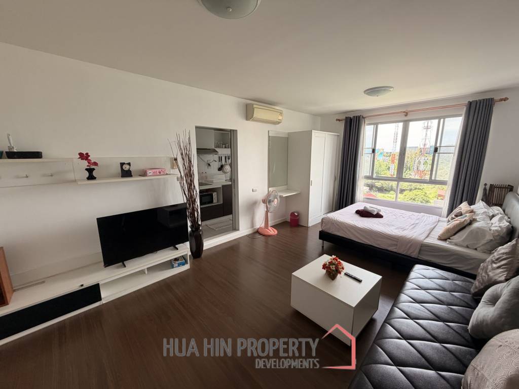 Modern 1-Bed Condo at Baan Kun Koey
