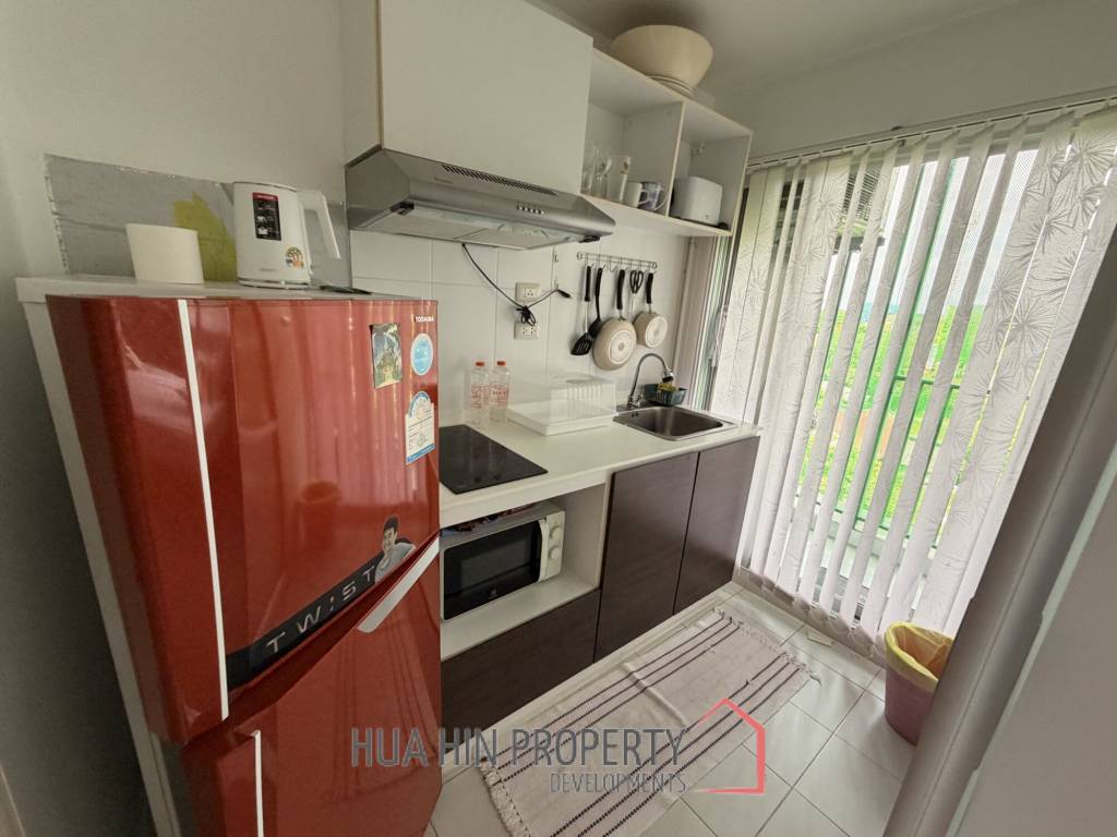 Modern 1-Bed Condo at Baan Kun Koey