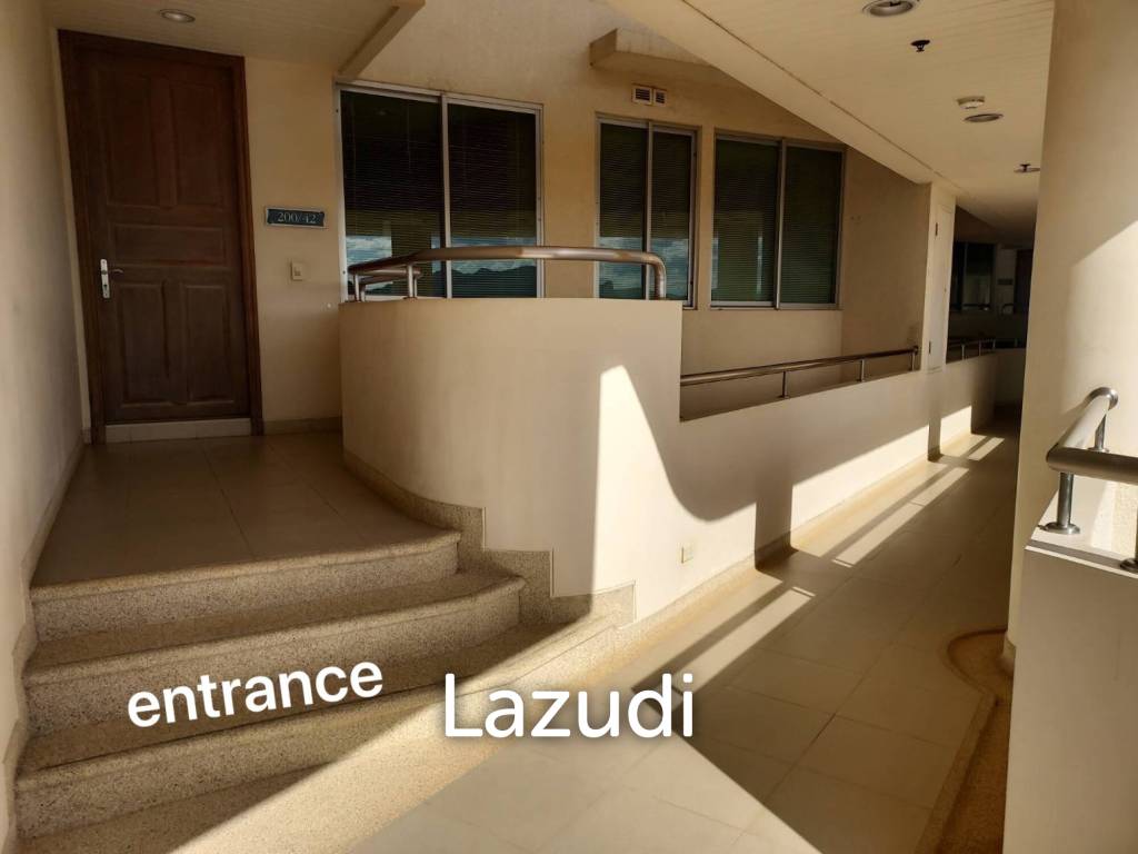 Stunning Beachfront Living: 3-BR Condo with 180° Sea Views
