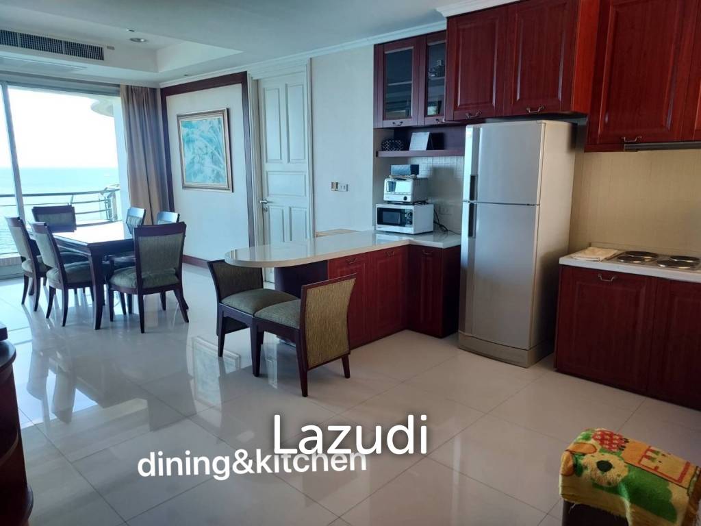 Stunning Beachfront Living: 3-BR Condo with 180° Sea Views