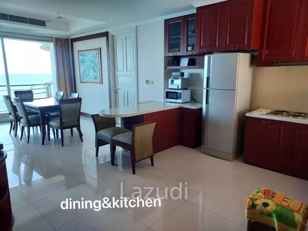 Stunning Beachfront Living: 3-BR Condo with 180° Sea Views