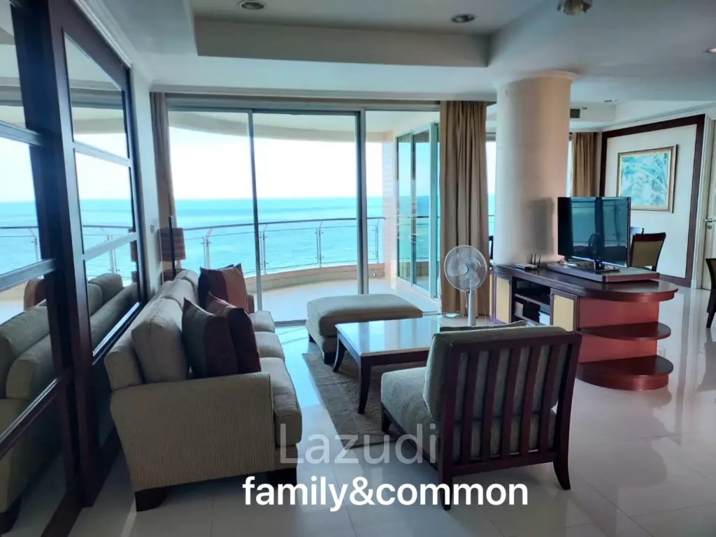 Stunning Beachfront Living: 3-BR Condo with 180° Sea Views