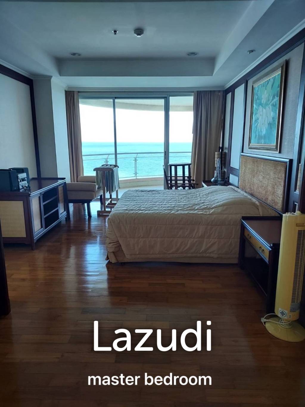 Stunning Beachfront Living: 3-BR Condo with 180° Sea Views