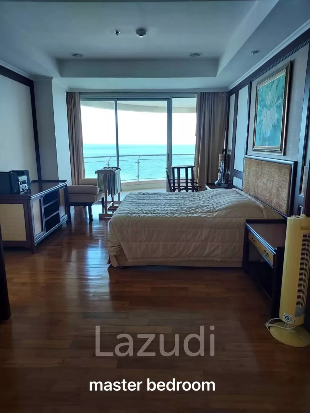 Stunning Beachfront Living: 3-BR Condo with 180° Sea Views