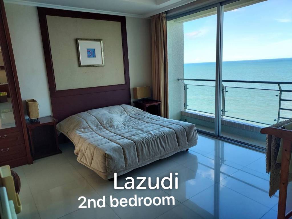 Stunning Beachfront Living: 3-BR Condo with 180° Sea Views