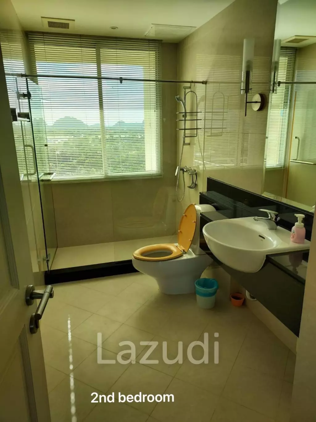 Stunning Beachfront Living: 3-BR Condo with 180° Sea Views