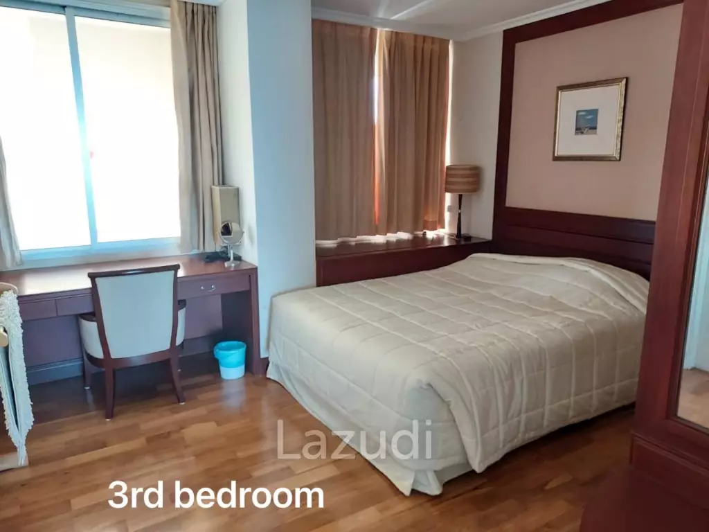 Stunning Beachfront Living: 3-BR Condo with 180° Sea Views