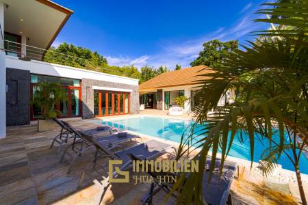 Surface habitable de 480 m² / 5 chambres + 5 salles de bains / Terrain de 1 400 m²