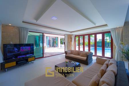Surface habitable de 480 m² / 5 chambres + 5 salles de bains / Terrain de 1 400 m²
