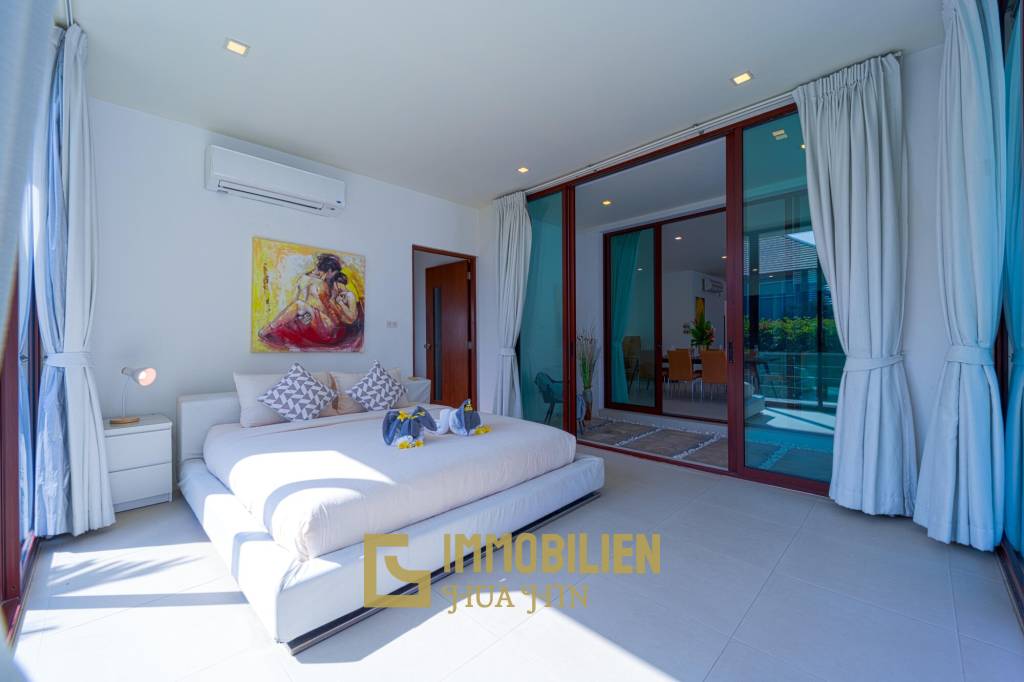 Surface habitable de 480 m² / 5 chambres + 5 salles de bains / Terrain de 1 400 m²