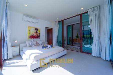 Surface habitable de 480 m² / 5 chambres + 5 salles de bains / Terrain de 1 400 m²
