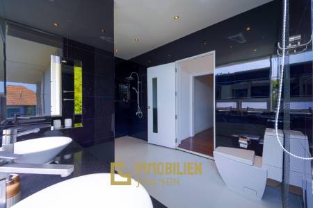 Surface habitable de 480 m² / 5 chambres + 5 salles de bains / Terrain de 1 400 m²