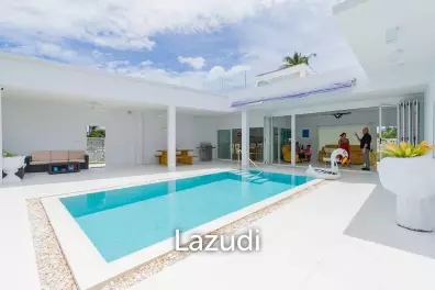 Well Designed Modern 4 Bed pool Villa on large land plot and near the beach.