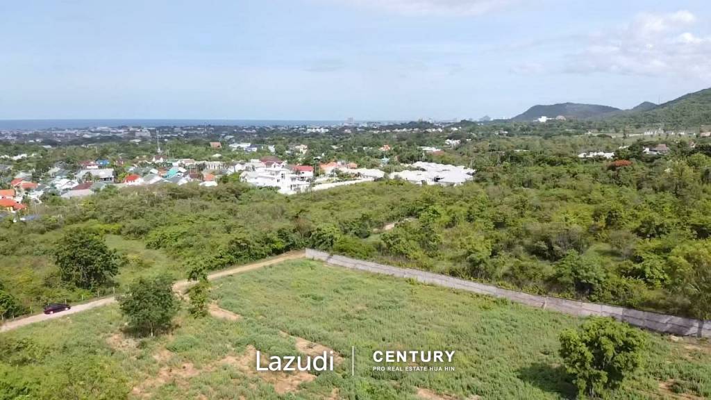 Elevated Large land plot of 4.72 Rai close to the town and has seaviews