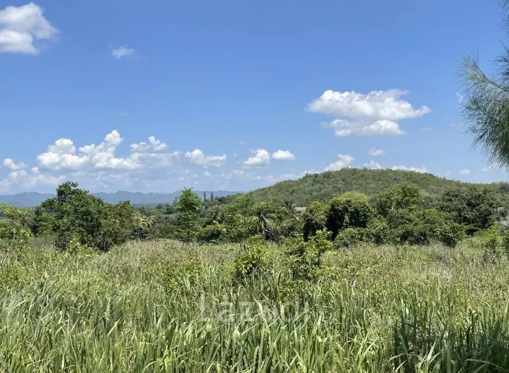Beautiful elevated land of 15 Rai with great views near Banyan Golf Club.
