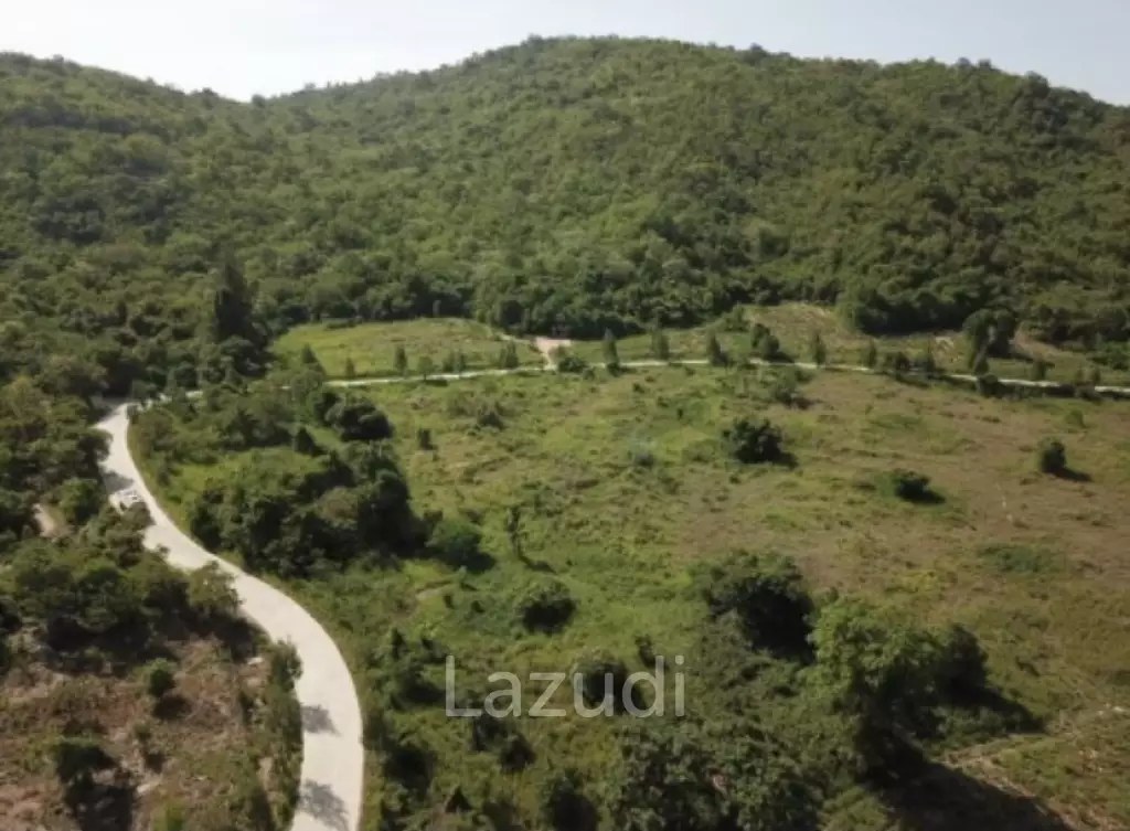 Beautiful elevated land of 15 Rai with great views near Banyan Golf Club.