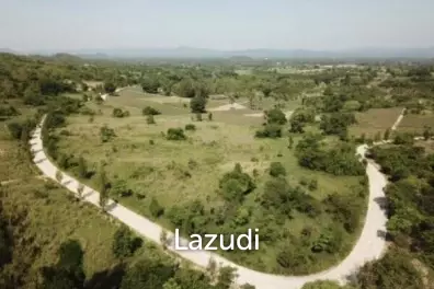 Beautiful elevated land of 15 Rai with great views near Banyan Golf Club.