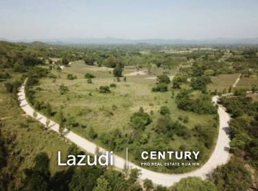 Beautiful elevated land of 15 Rai with great views near Banyan Golf Club.