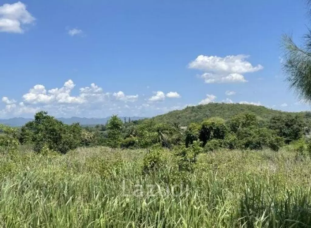 Beautiful elevated land of 15 Rai with great views near Banyan Golf Club.