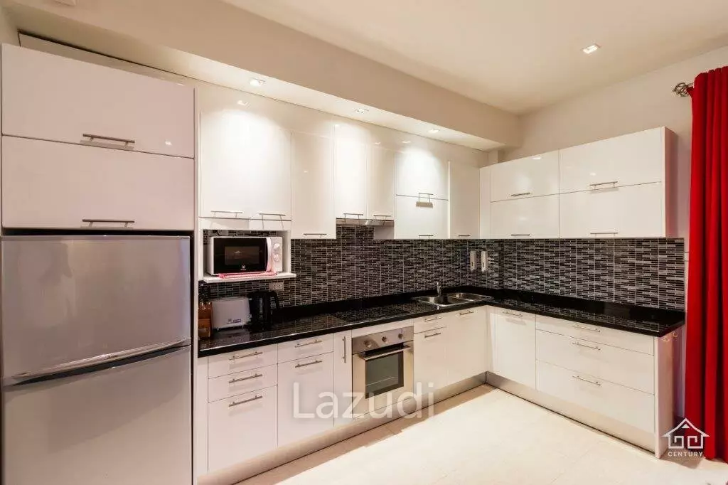 BLUE LAGOON : Immaculately presented 2nd floor 2 bed condo overlooking large swimming pool lagoon.