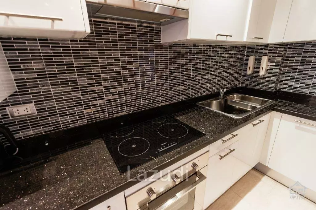 BLUE LAGOON : Immaculately presented 2nd floor 2 bed condo overlooking large swimming pool lagoon.