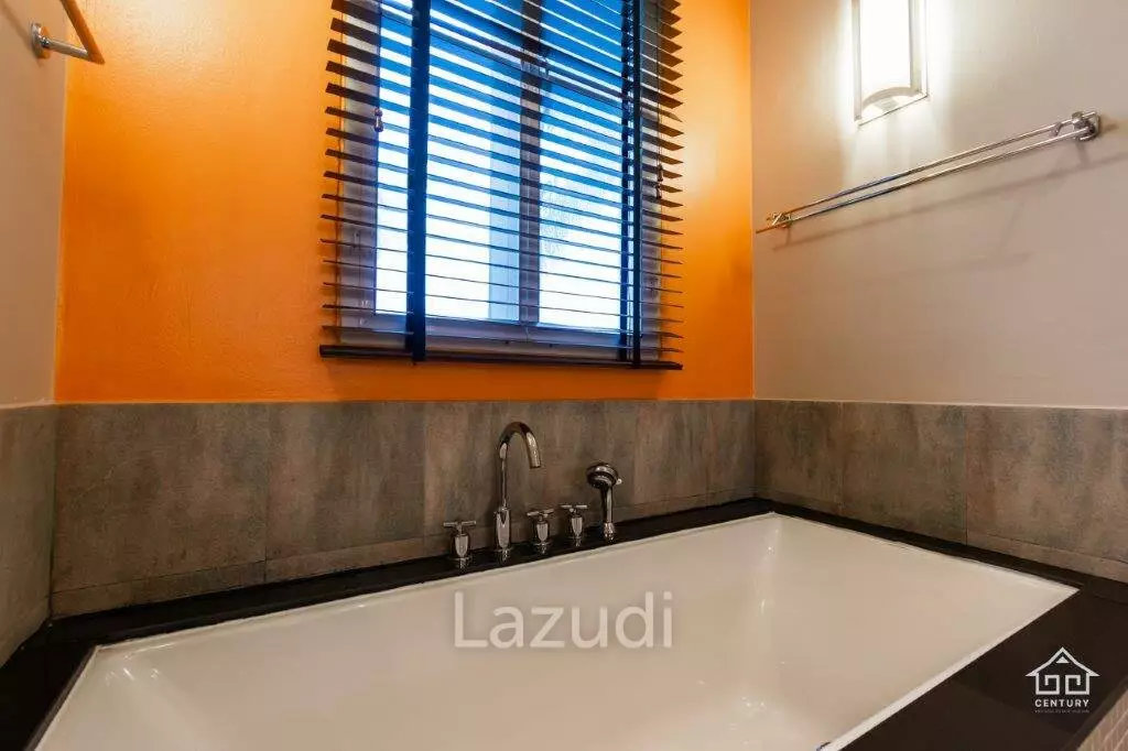 BLUE LAGOON : Immaculately presented 2nd floor 2 bed condo overlooking large swimming pool lagoon.
