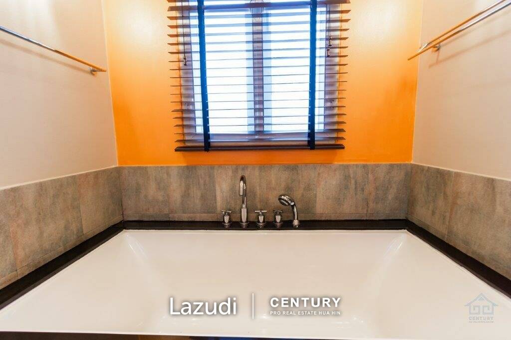 BLUE LAGOON : Immaculately presented 2nd floor 2 bed condo overlooking large swimming pool lagoon.
