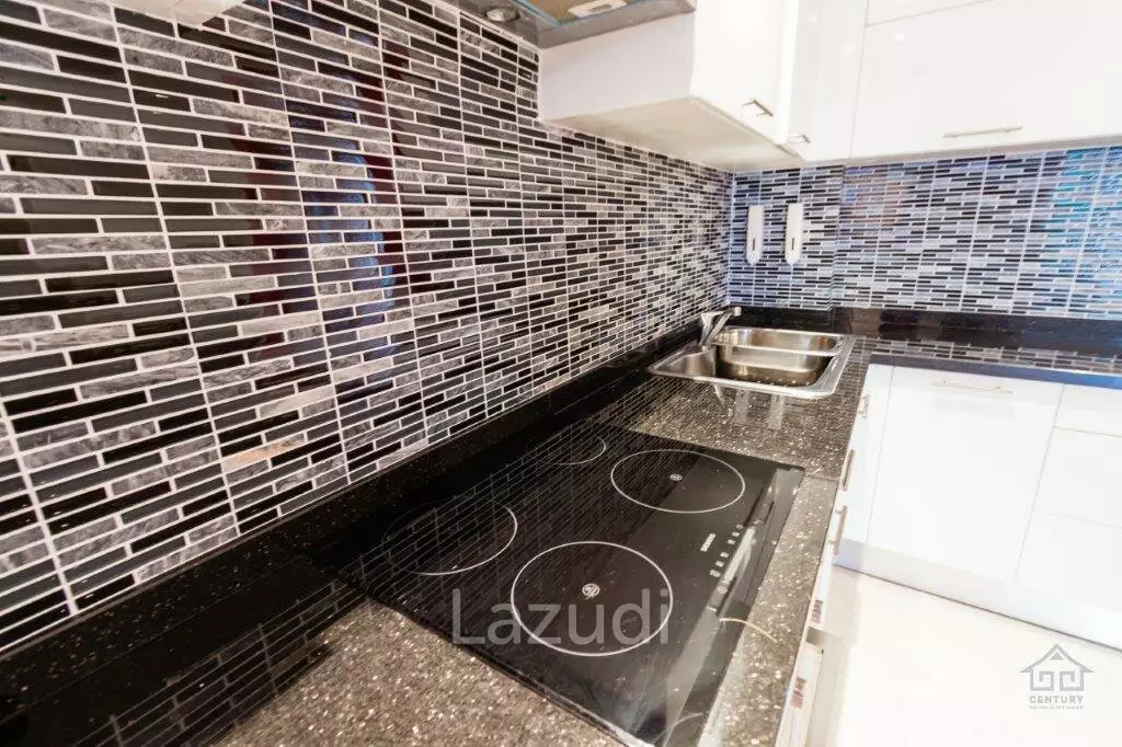 BLUE LAGOON : Immaculately presented 2nd floor 2 bed condo overlooking large swimming pool lagoon.