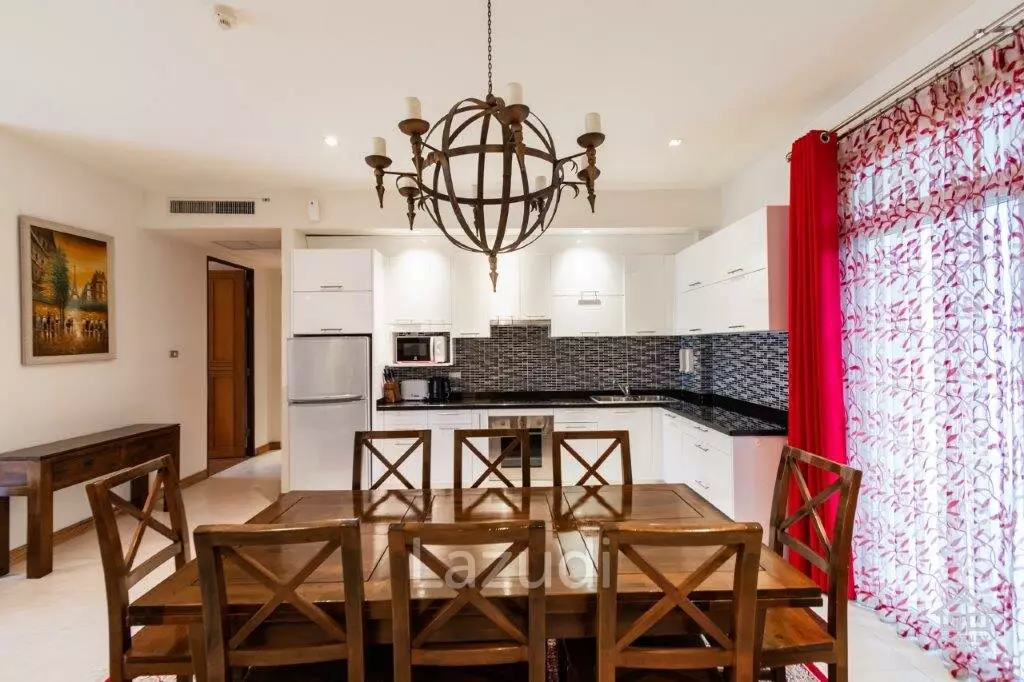 BLUE LAGOON : Immaculately presented 2nd floor 2 bed condo overlooking large swimming pool lagoon.