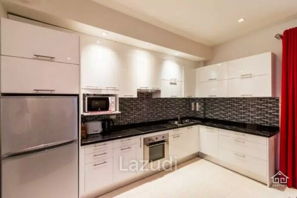 BLUE LAGOON : Immaculately presented 2nd floor 2 bed condo overlooking large swimming pool lagoon.