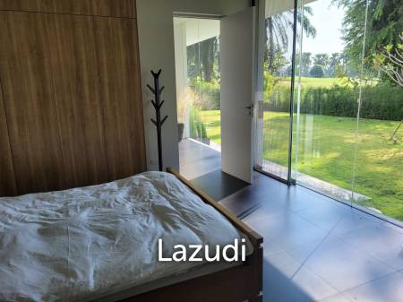 Modern villa with panoramic golf course view sitting on green valley