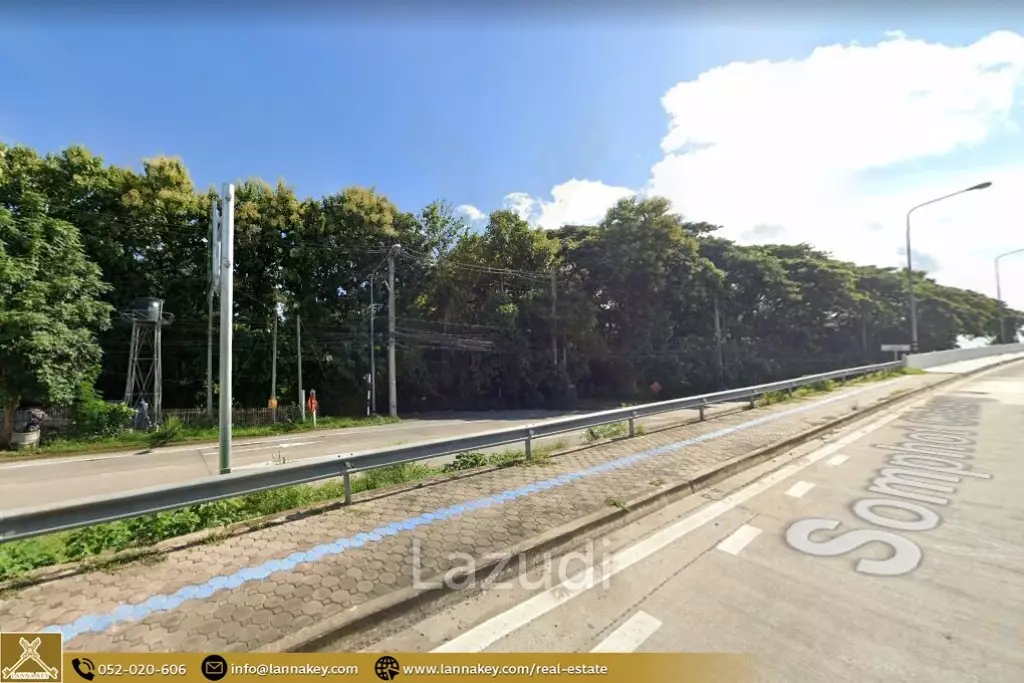 Land adjacent to the bridge and main road